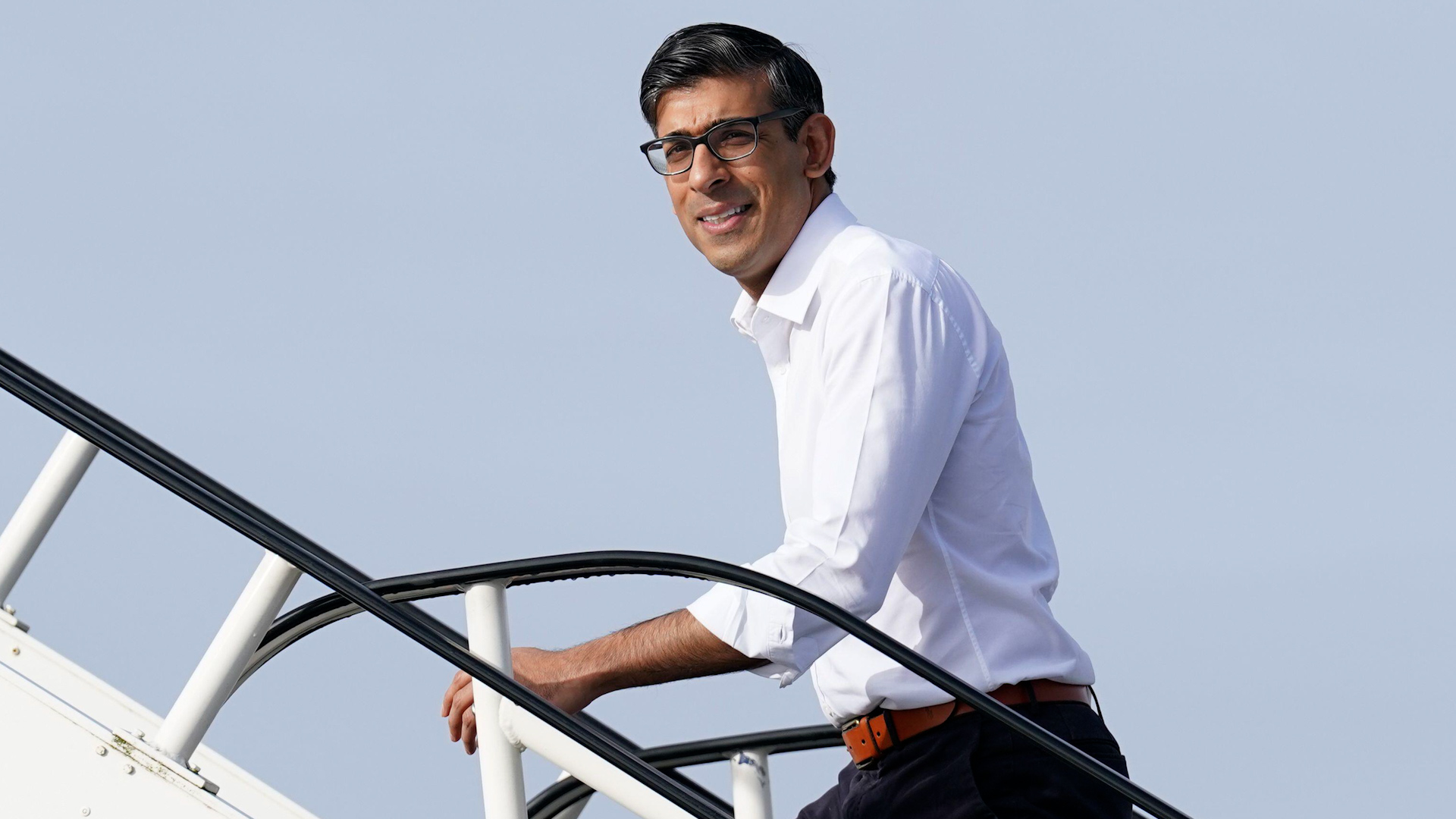 Prime Minister Rishi Sunak boards a plane at Stansted Airport in Essex for his flight to San Diego