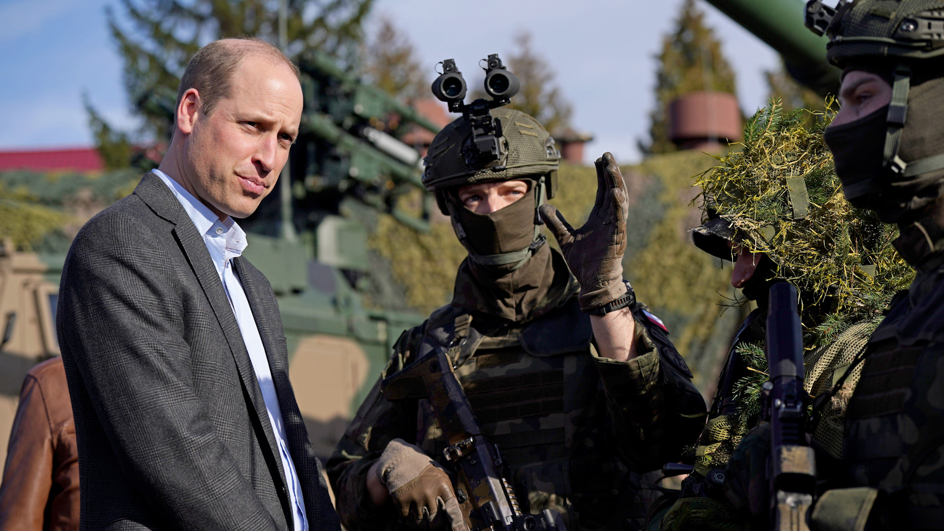  The Prince of Wales (left) meeting members of the Polish military during a visit to the 3rd Brigade Territorial Defence Force base, in Rzeszow, Poland