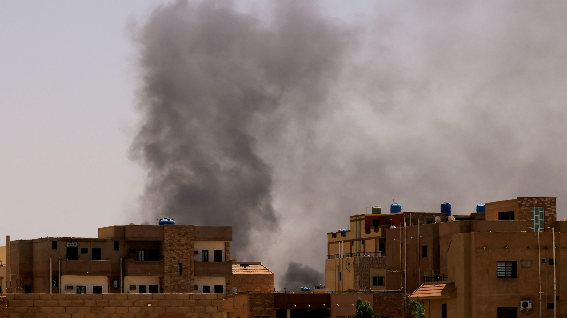 Smoke is seen rise from buildings during clashes between the paramilitary Rapid Support Forces and the army in Khartoum North, Sudan