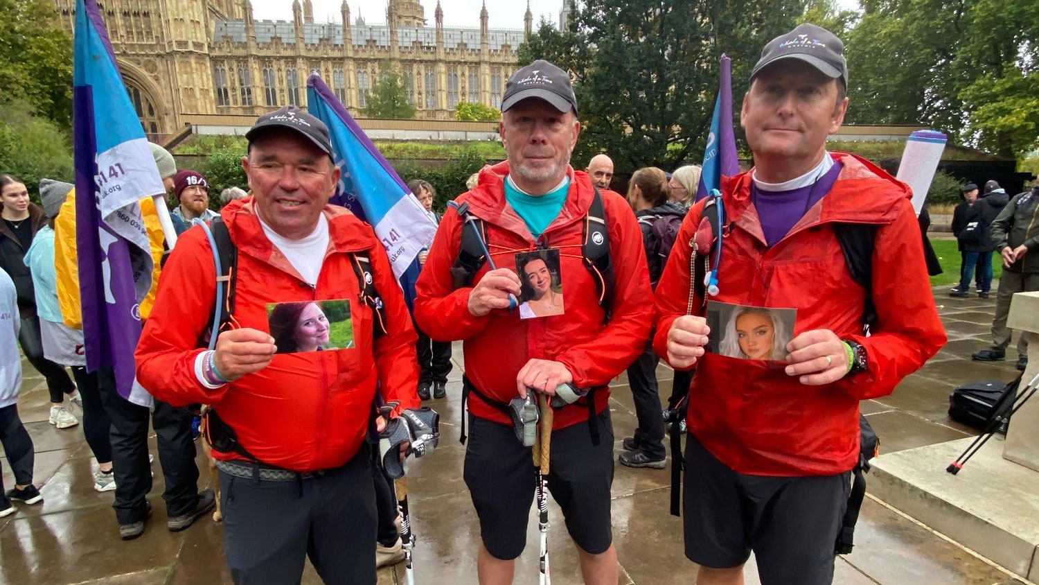 3 Dads Walking men ending their trek at Westminster and holding pictures of their daughters NO CREDIT NEEDED