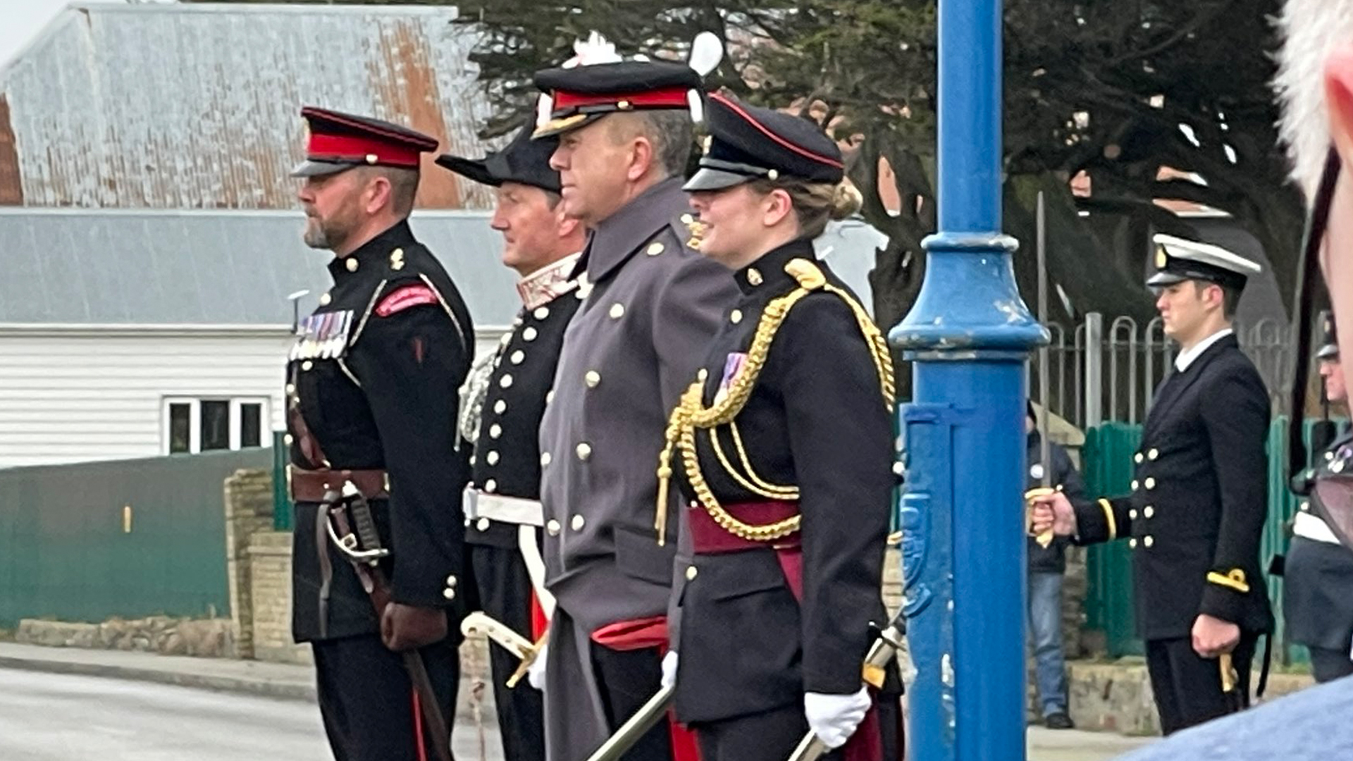 After inspecting the parade, the new Governor forms up with the officers