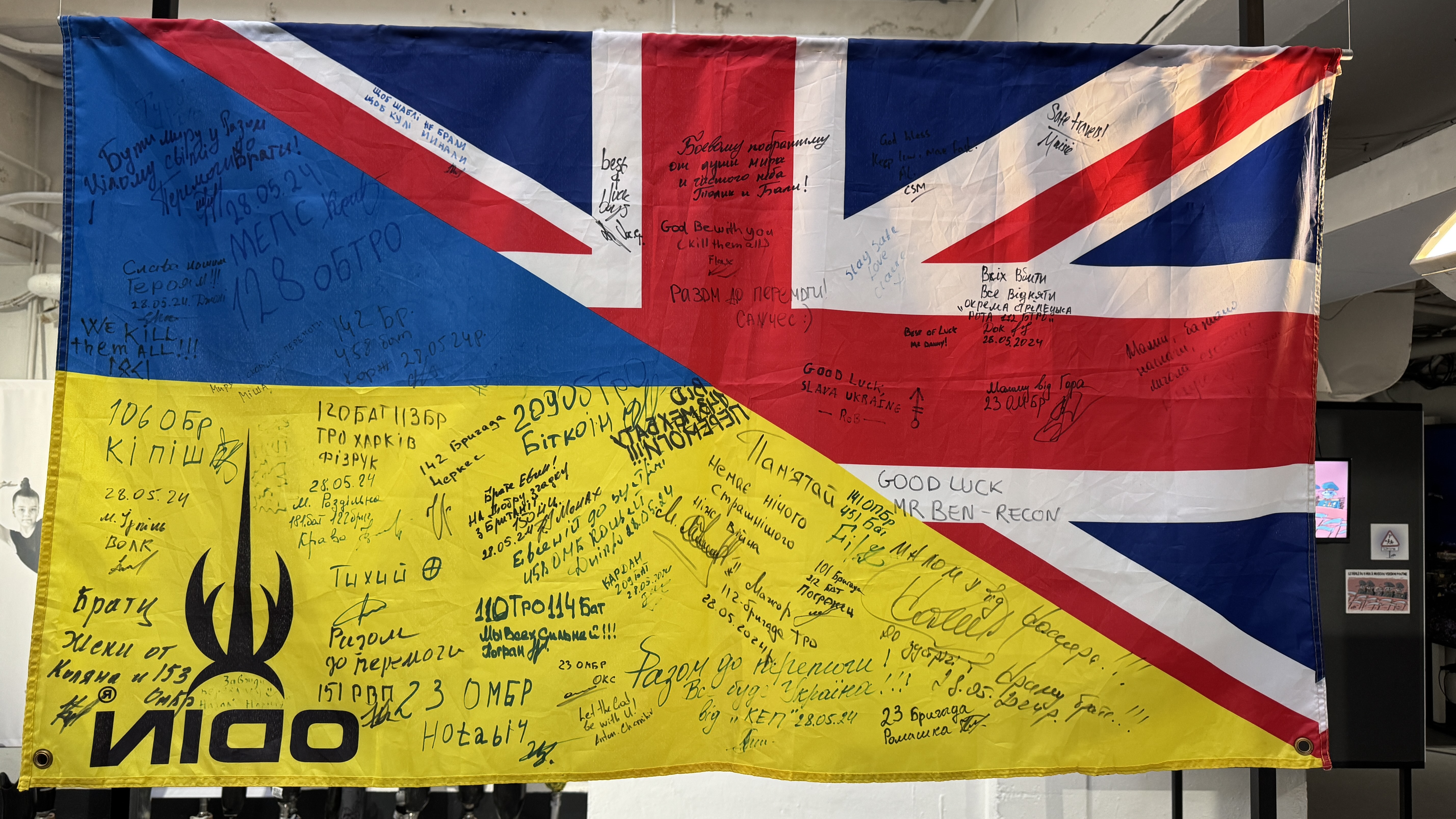 Among the items on display is a flag from the training of Ukrainian soldiers in the UK - more than 56,000 have participated in such training under Operation Interflex