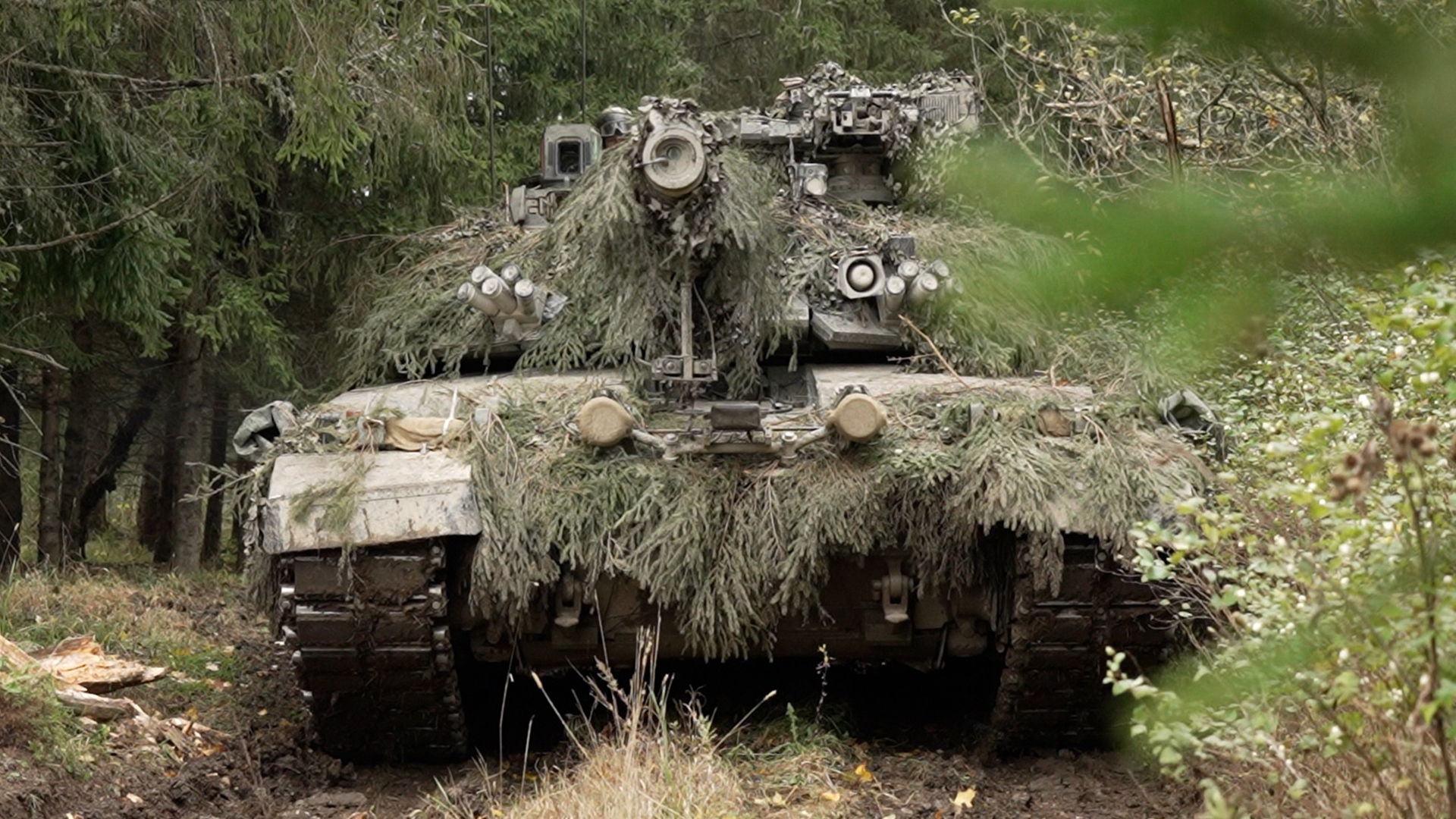 Most AFV have to have track tension adjusted manually, but vehicles like the Challenger 2 have an automatic system