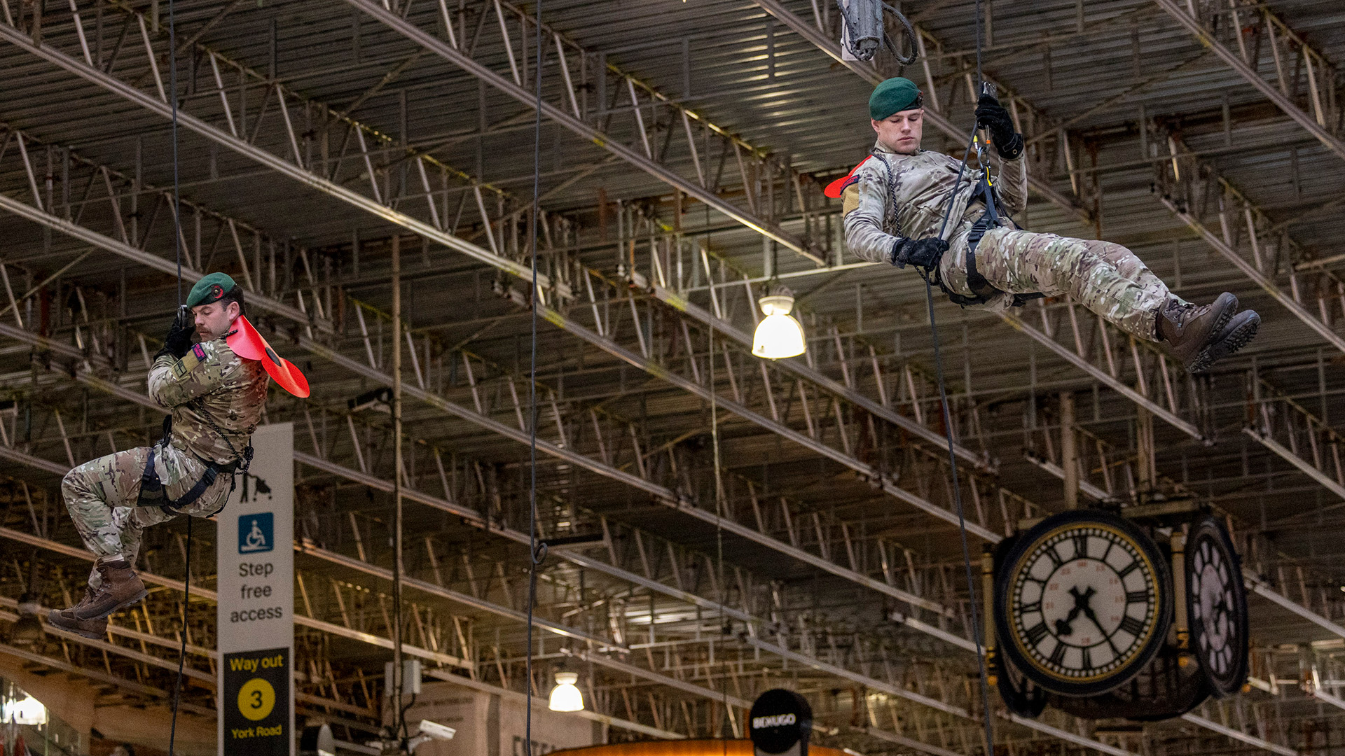 Royal Marines abseil down the clock tower at Waterloo Station (Picture: RBL)
