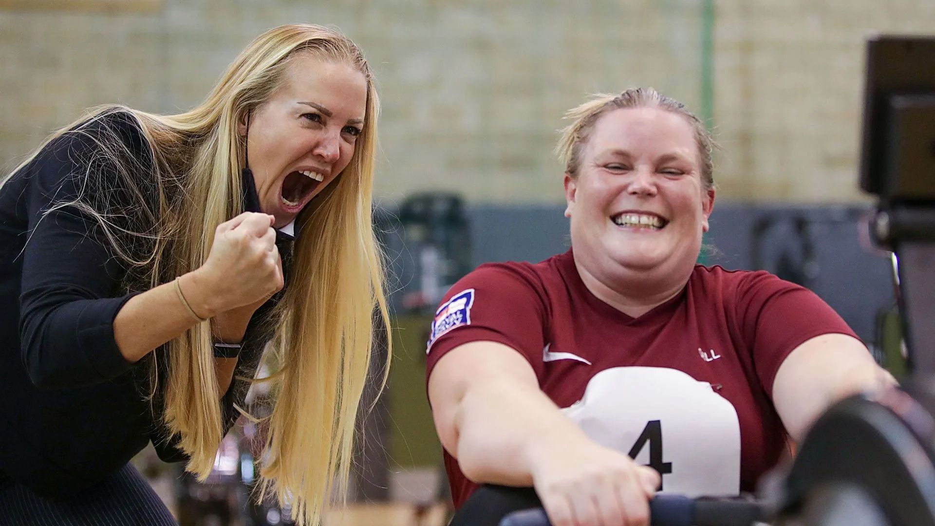WO Cheal encourages a fellow sailor during a recovery triathlon event