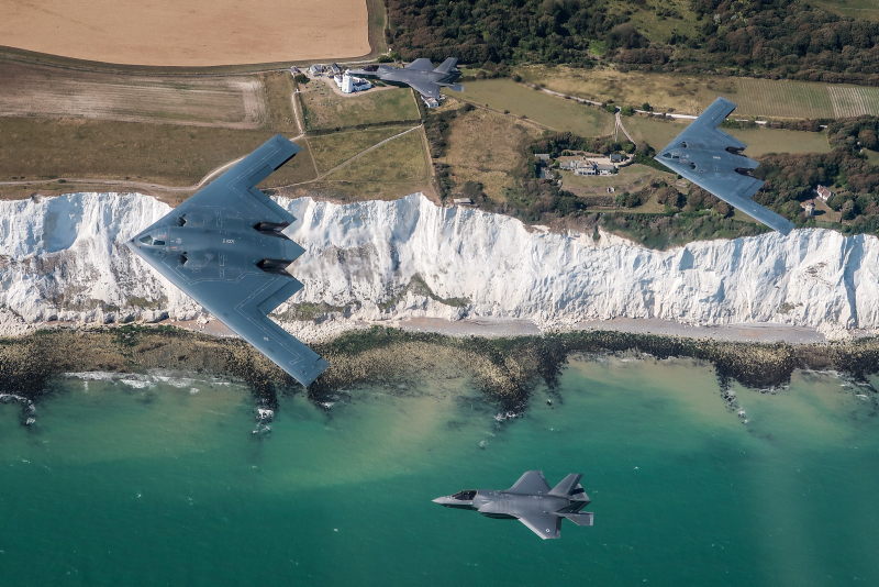Two UK F-35 Lightning jets (above and below), seen here flying in formation with two B-2 Spirit stealth bombers of the United States Air Force, as part of their deployment to RAF Fairford in Gloucestershire, UK.