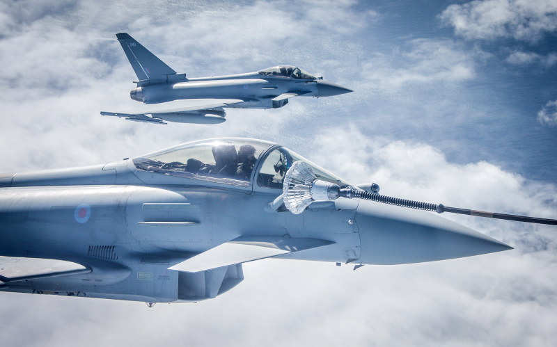 An RAF Typhoon taking on fuel from a Voyager during a refuelling bracket on Exercise COBRA WARRIOR.