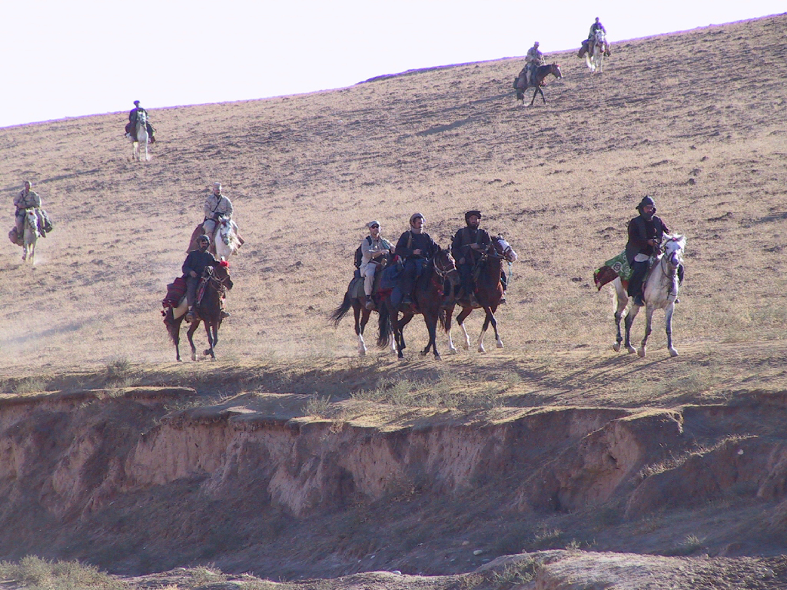 Green Berets and Northern Alliance fighters in Afghanistan in 2001