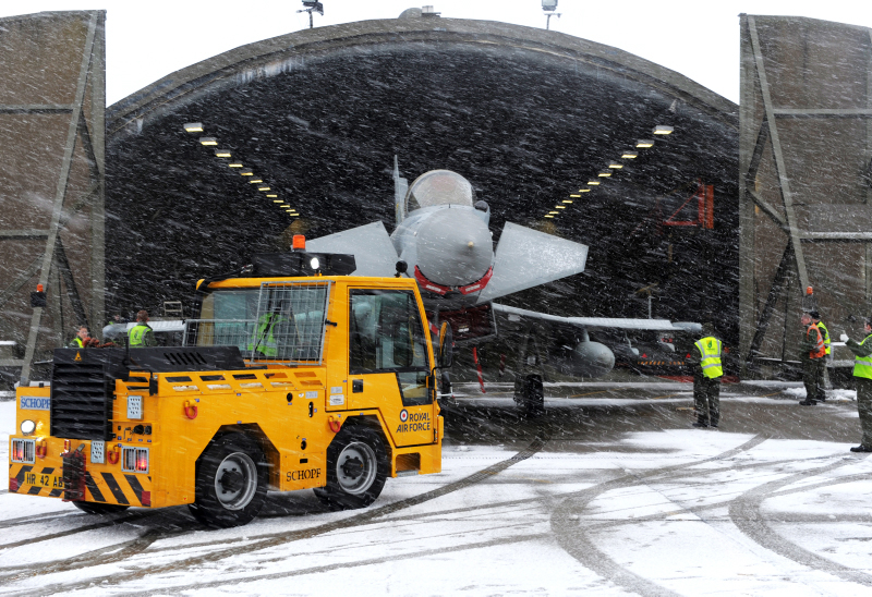 A Typhoon jet is towed from its hangar aka ‘shed’ at RAF Coningsby. Credit: Corporal Andrew Seaward, Crown Copyright 