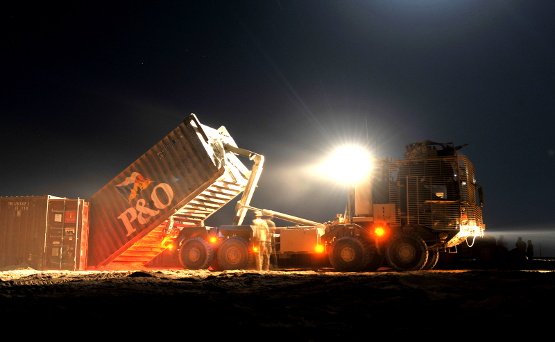 An Army logistics vehicle moves a container of supplies in Afghanistan. Credit: Sgt Rupert Frere RLC, Crown Copyright