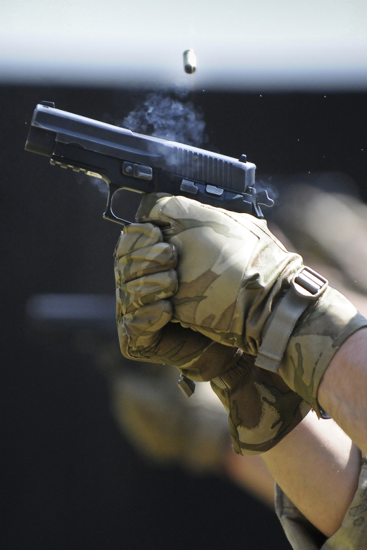 A Sig Sauer pistol aka a ‘Hip Flask’. Credit: Senior Aircraftsman Daniel Herri, Crown Copyright 