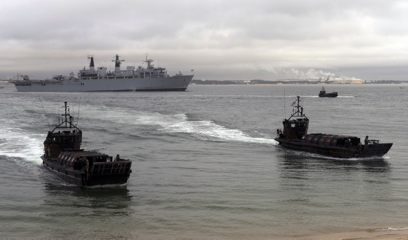 Royal Navy Marines taking part in a simulated beach landing using Landing Platform Dock ships