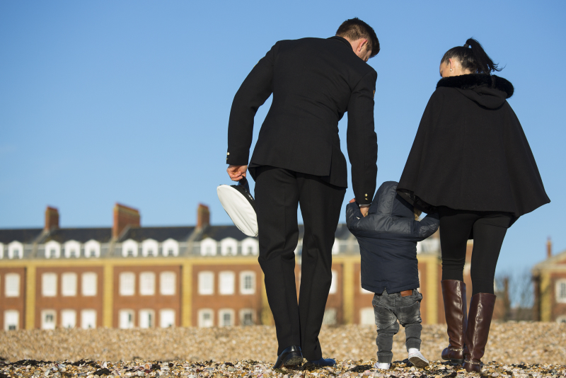 Navy personnel and his family. POA(Phot) Owen Cooban, Crown Copyright
