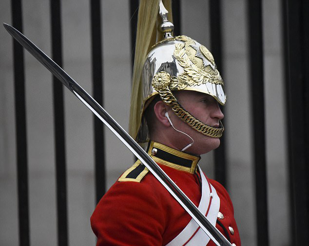 Soldier wearing headphones on Horse Guards Parade