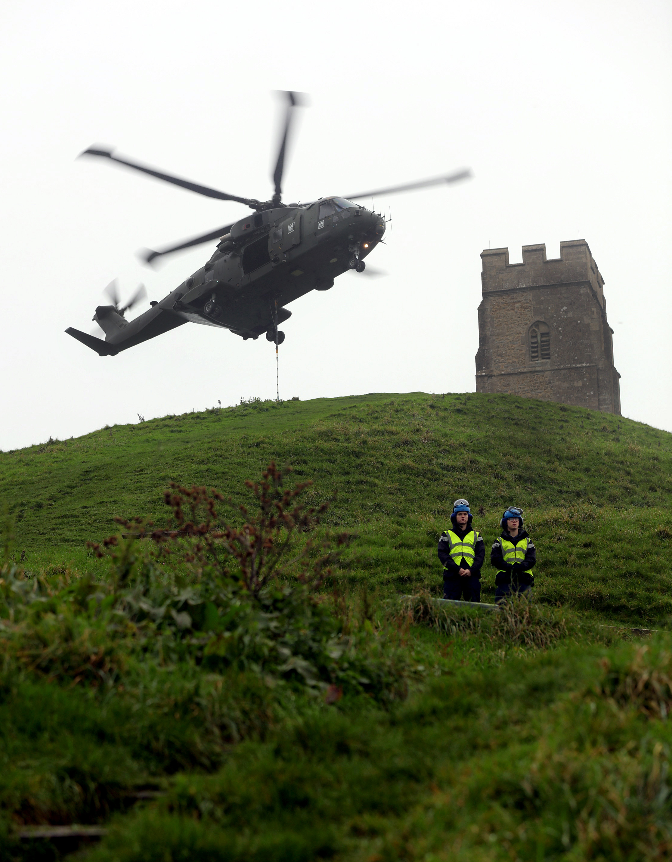 846 NAS Engineer Personnel Stop Eager Onlookers From Entering The Danger Area