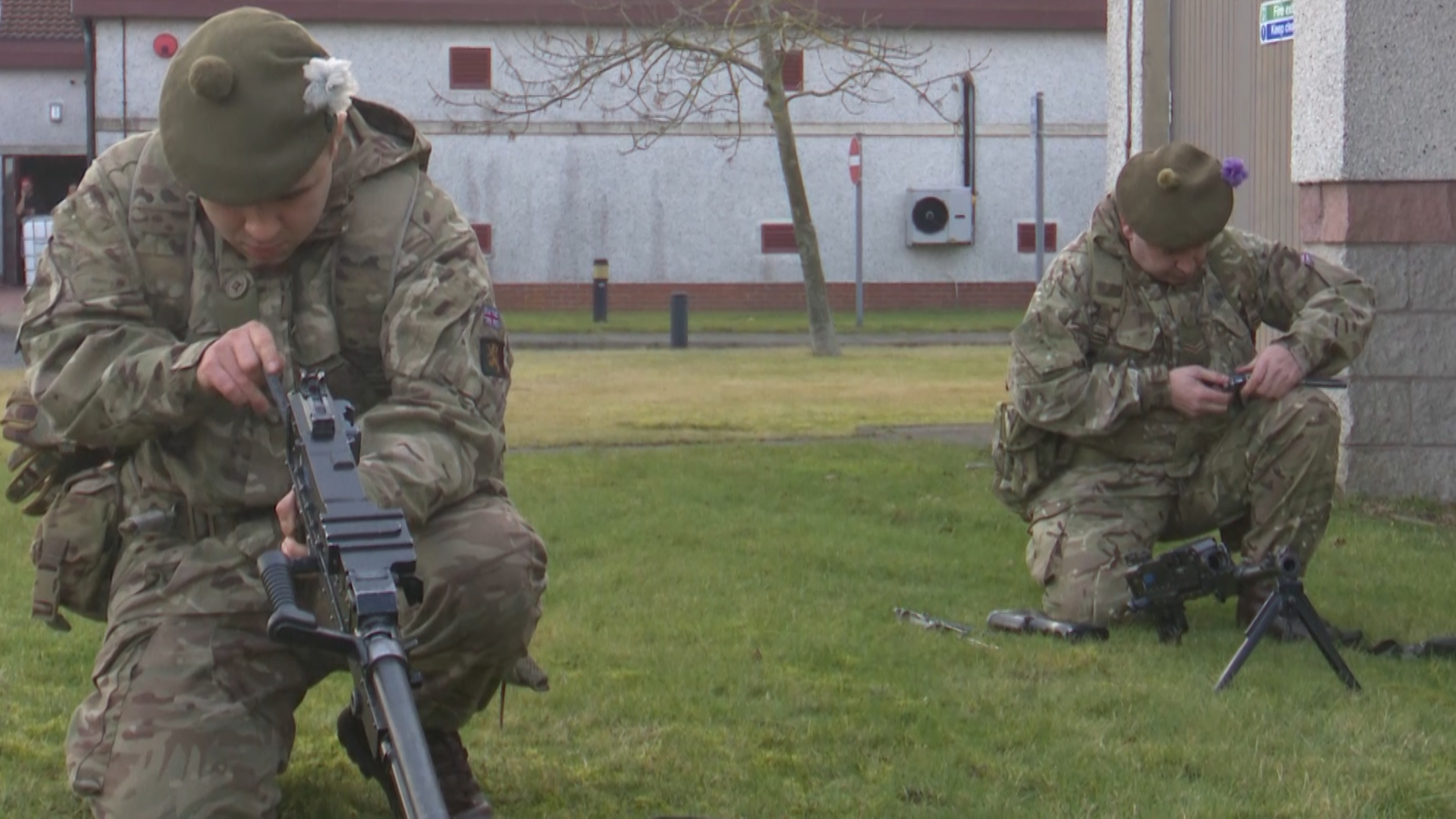 Reservists from the Royal Regiment of Scotland assemble general purpose machine guns.
