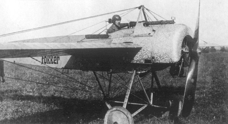 A pilot sitting in a Fokker Eindecker EII, fitted with his new synchronisation device