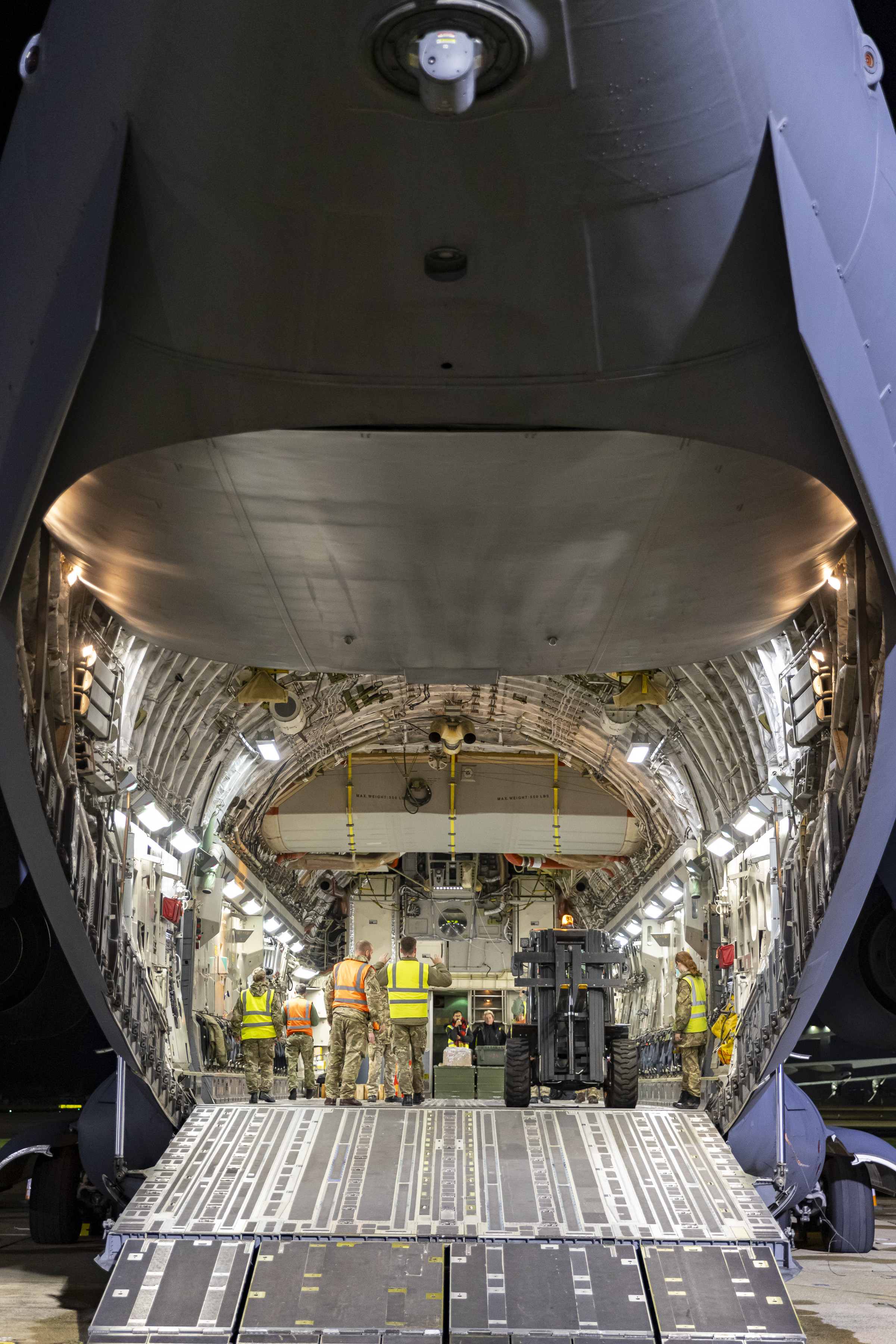 99 Squadron Movers load a Royal Air Force C-17 aircraft with UK aid heading to Egypt for the Palestinians in Gaza 251023 CREDIT MOD.j