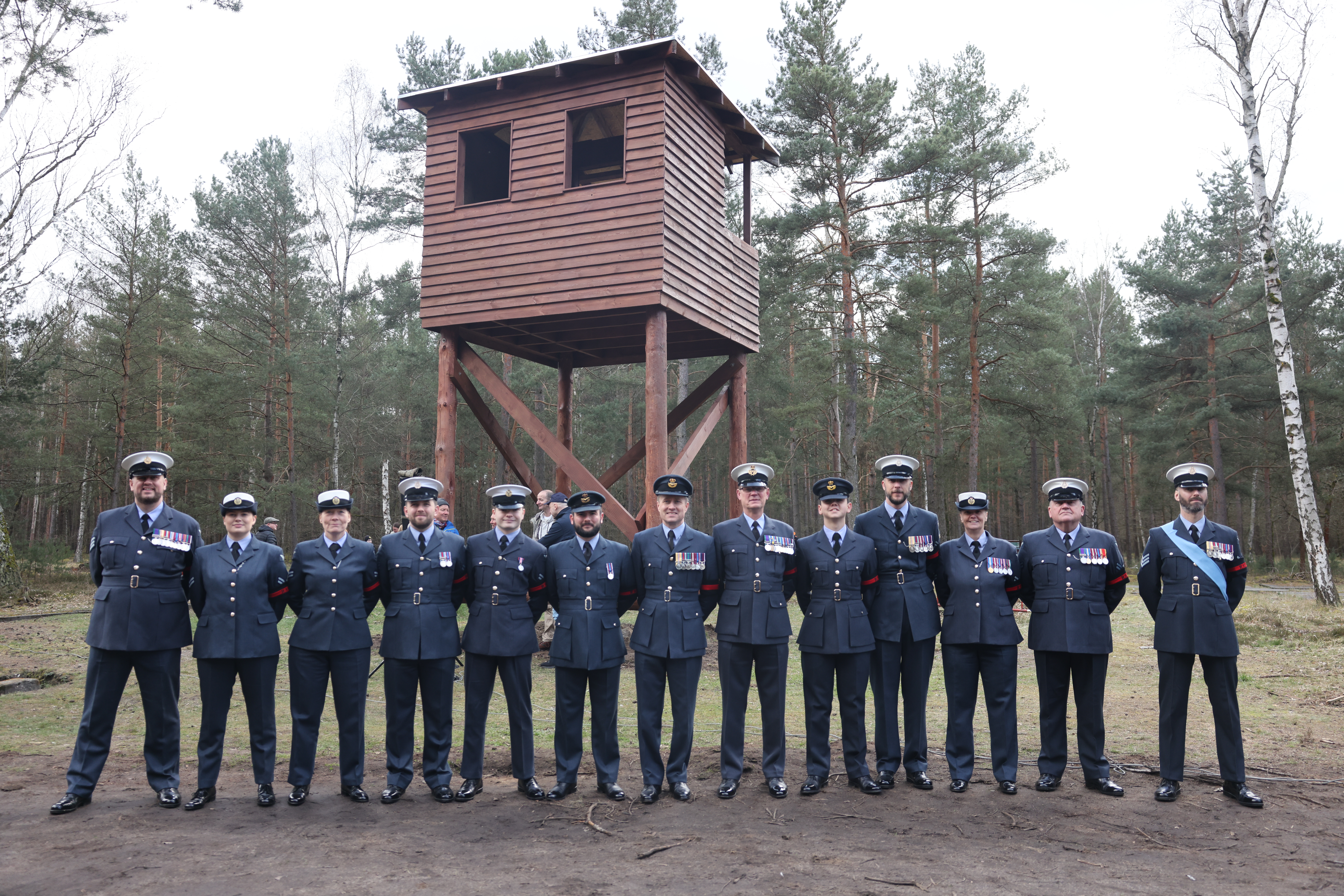 Royal Air Force Police personnel on parade at the site of Stalag Luft III