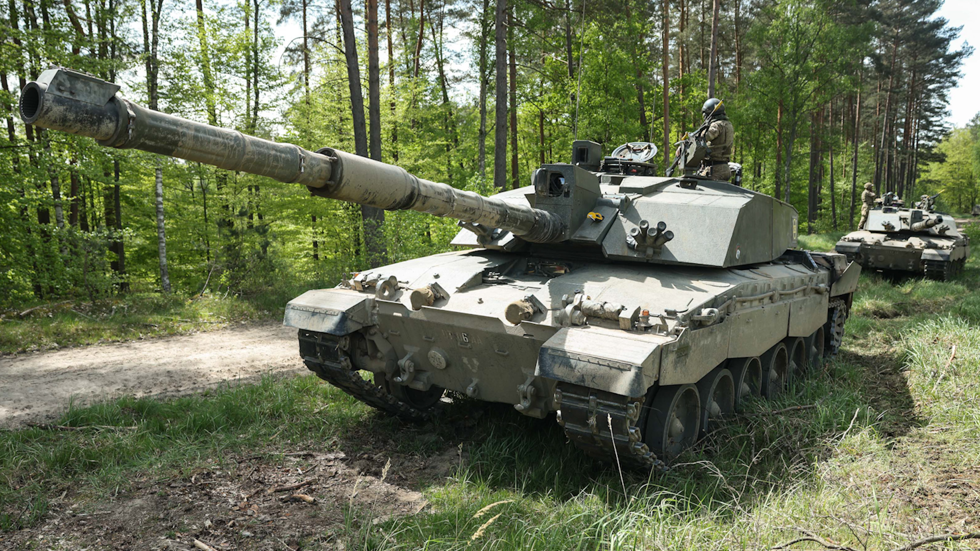 A Challenger 2 Main Battle Tank sits next to a track during Ex Steadfast Defender 21052024 CREDIT Army