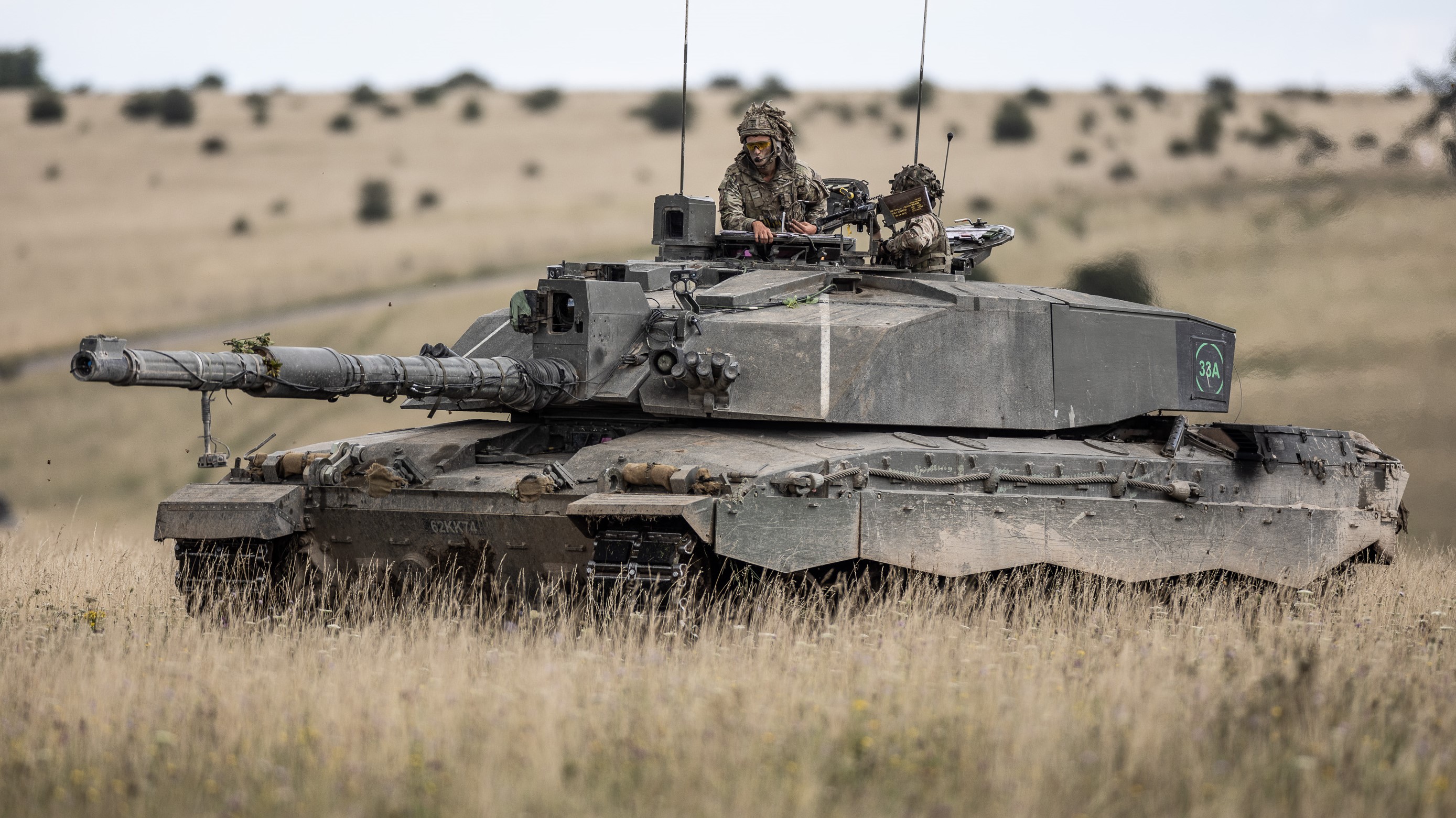 A Challenger 2 tank rolling across Salisbury Plain, Exercise IRON CYCLONE 25072023 CREDIT MOD.jpg