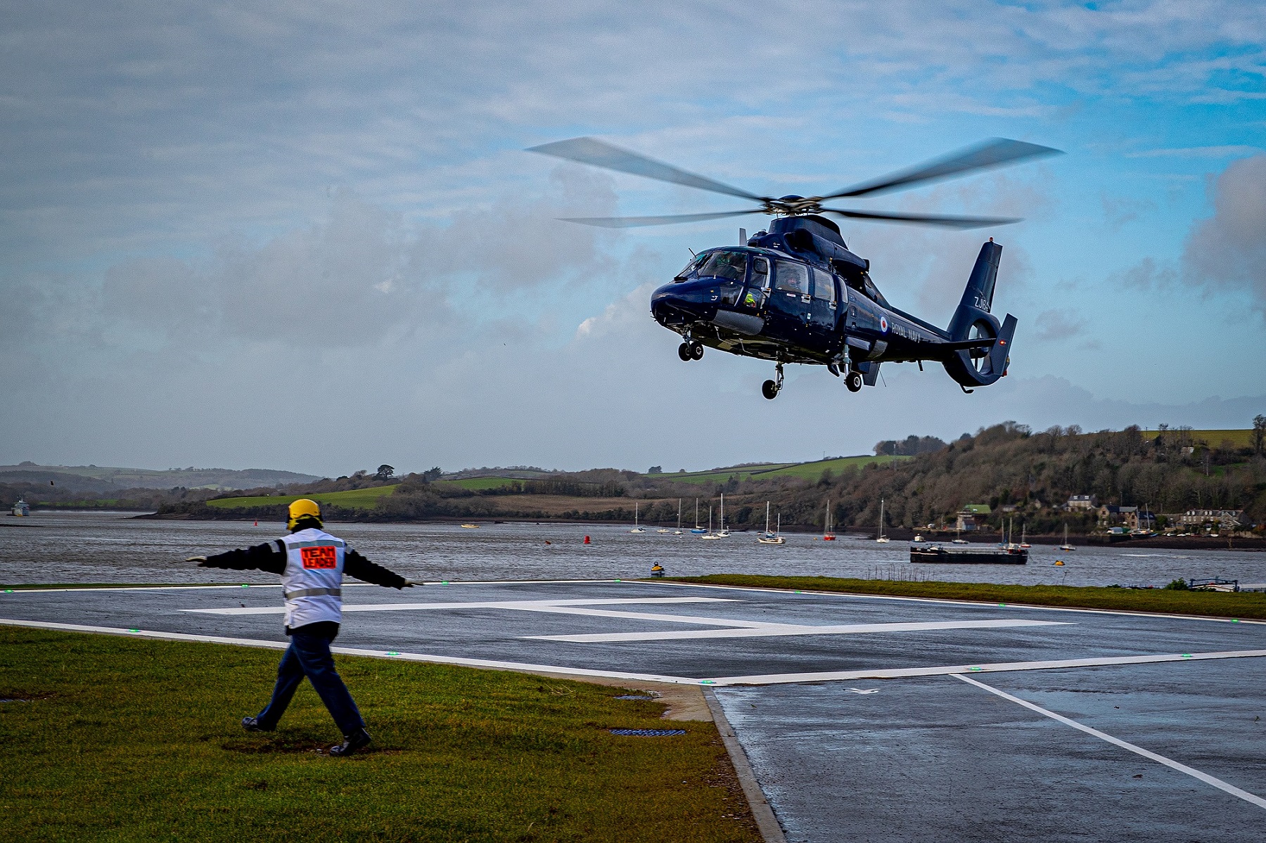 Cover image: A Dauphin helicopter touches down at the new Helicopter Operating Facility at HMNB Devonport (Picture: Royal Navy). 