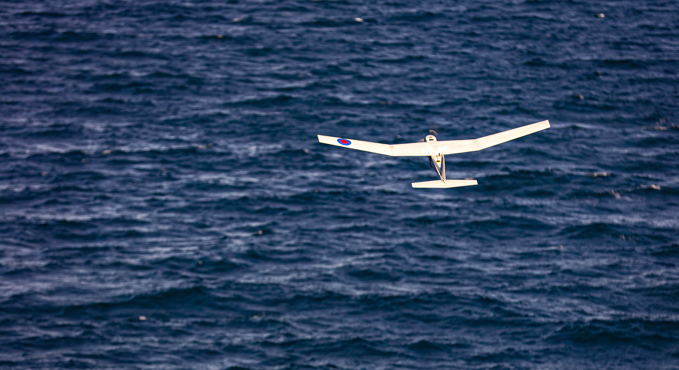 Cover image: A Puma drone flying low over the English Channel (Picture: Royal Navy).