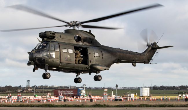 An RAF Puma departs Manston Airfield with COVID tests, to support British soldiers testing lorry drivers (Picture: MOD).
