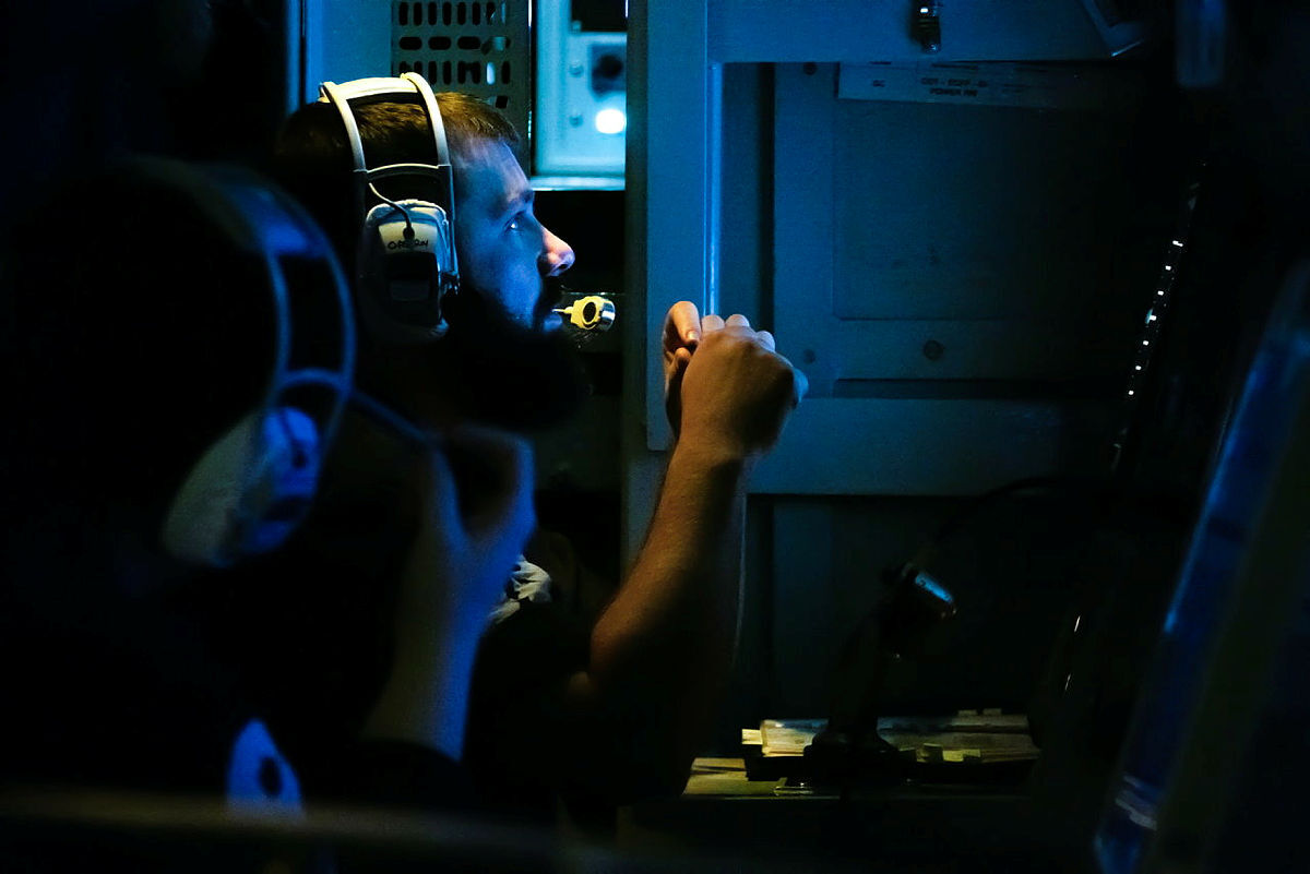 A Royal Navy officer sits in the gun directors chair during the live firing exercise in the Baltic Region as part of JEF operations in the Baltic Sea. Credit Crown Copyright.jpg