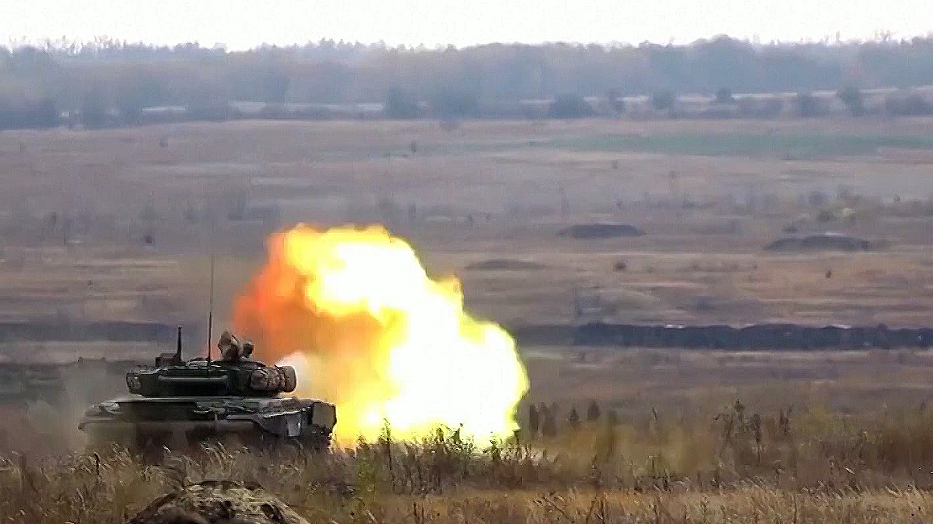 A Russian tank fires during an exercise near the country's border with Ukraine in early December (Picture: Russian MOD).