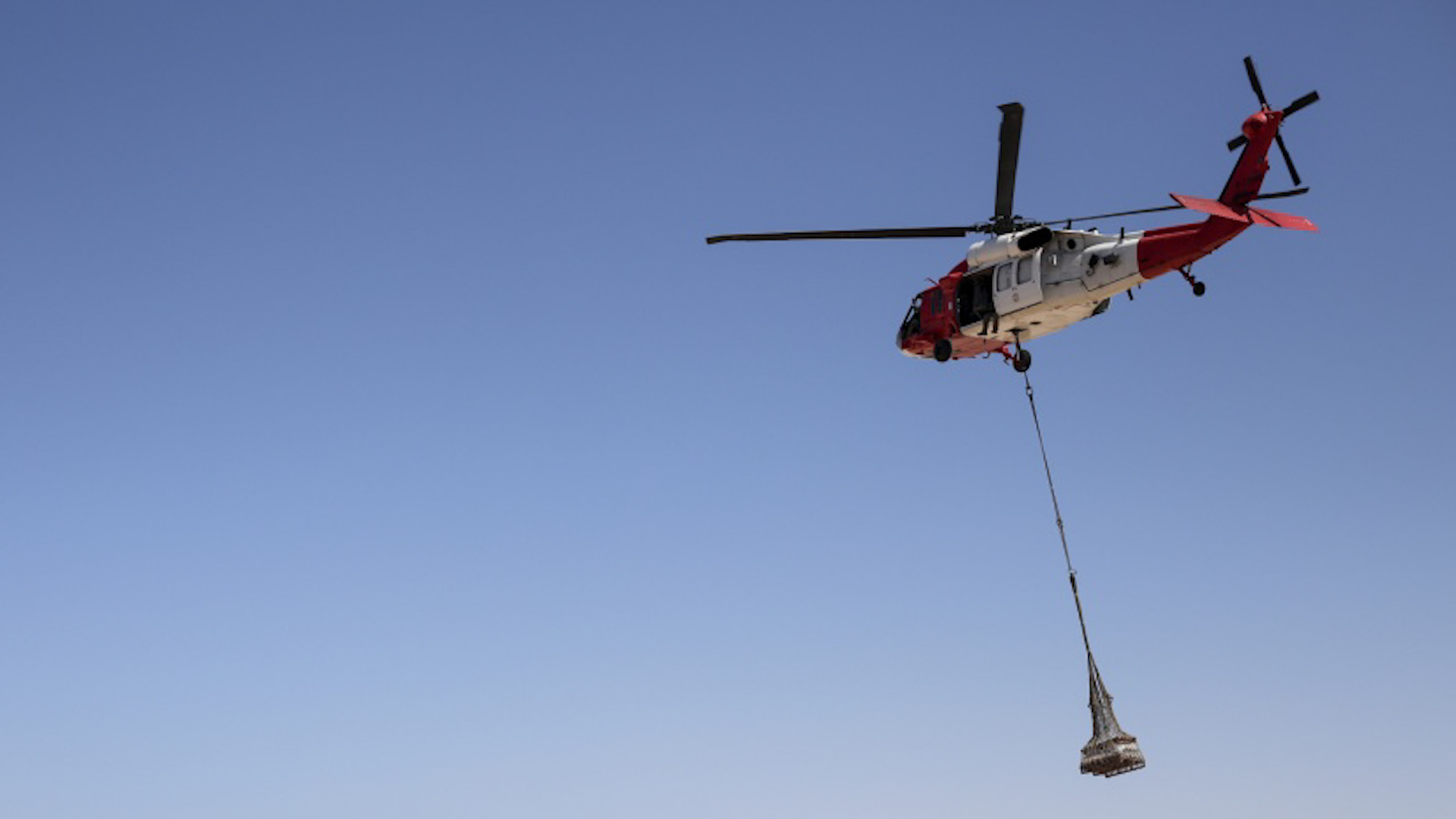 A Task Force Sinai UH-60 Blackhawk Helicopter resupplies a Multinational Force and Observers remote site over the Gulf of Aqaba in the Sinai Peninsula 120919 CREDIT US Department of Defense.jpg 