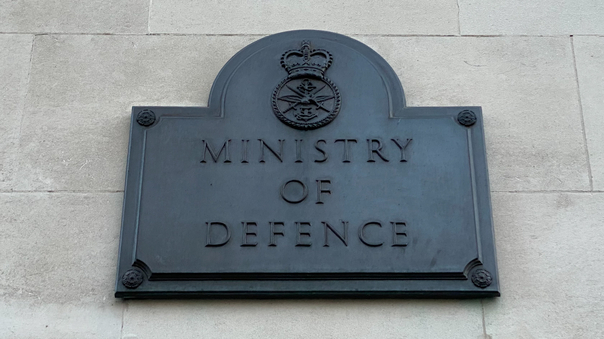 A close up view of the MOD sign at Main Building in London
