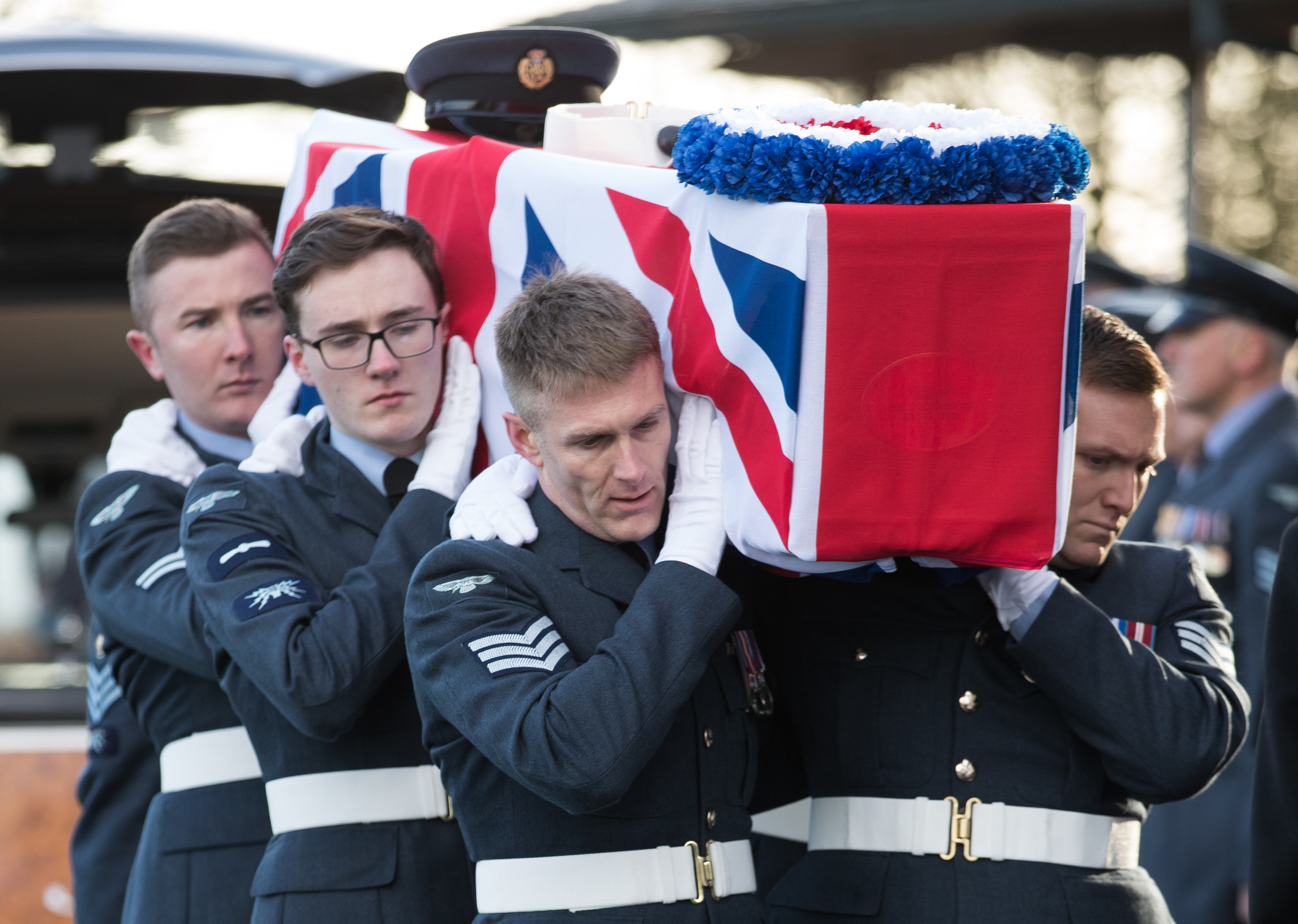 A coffin is carried during the funeral of Victor and Edna Barnett CREDIT Aaron Chown-PA Images