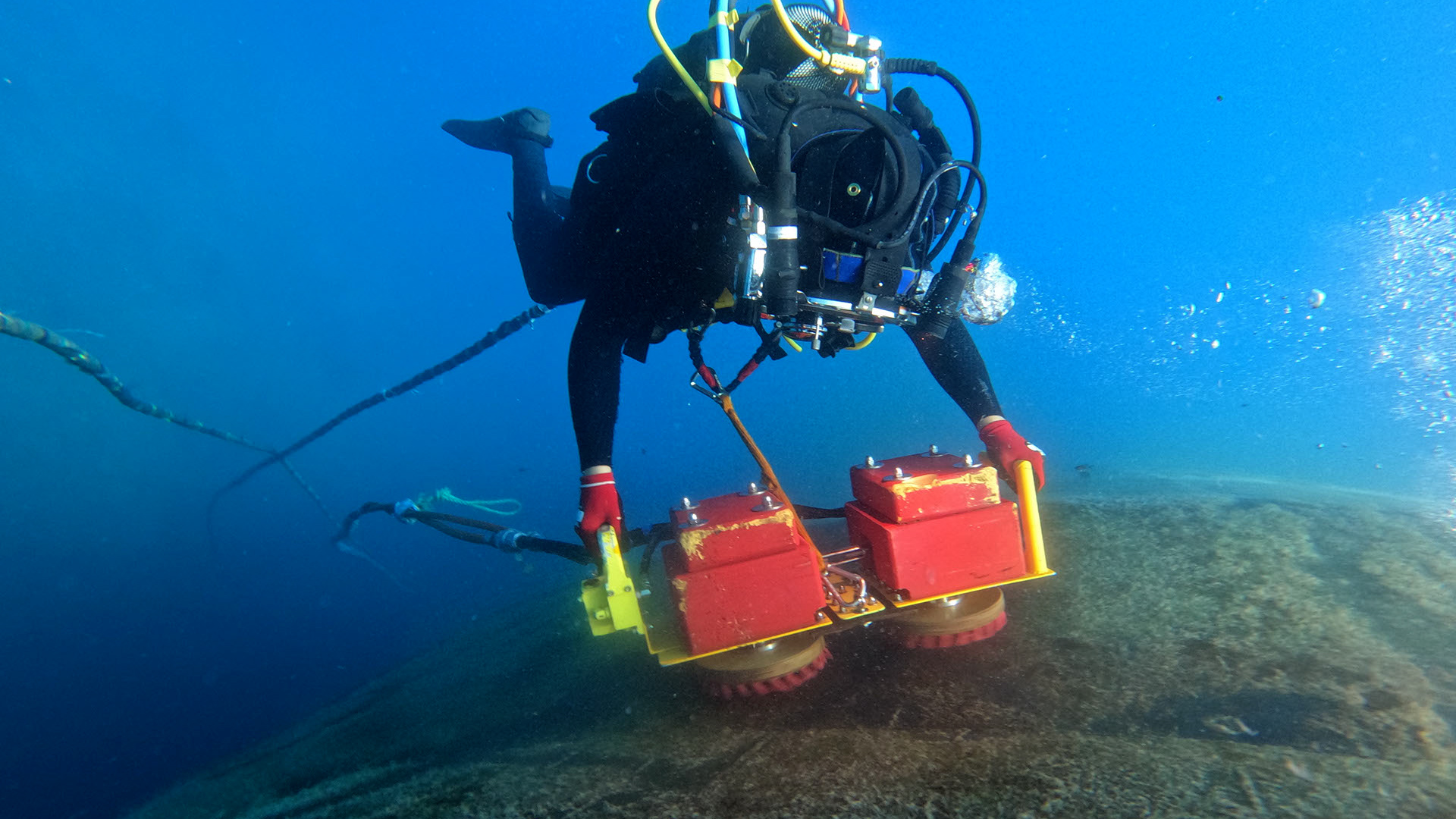 A diver cleans the hull of HMS Audacious in Souda Bay Crete (Picture: Royal Navy).