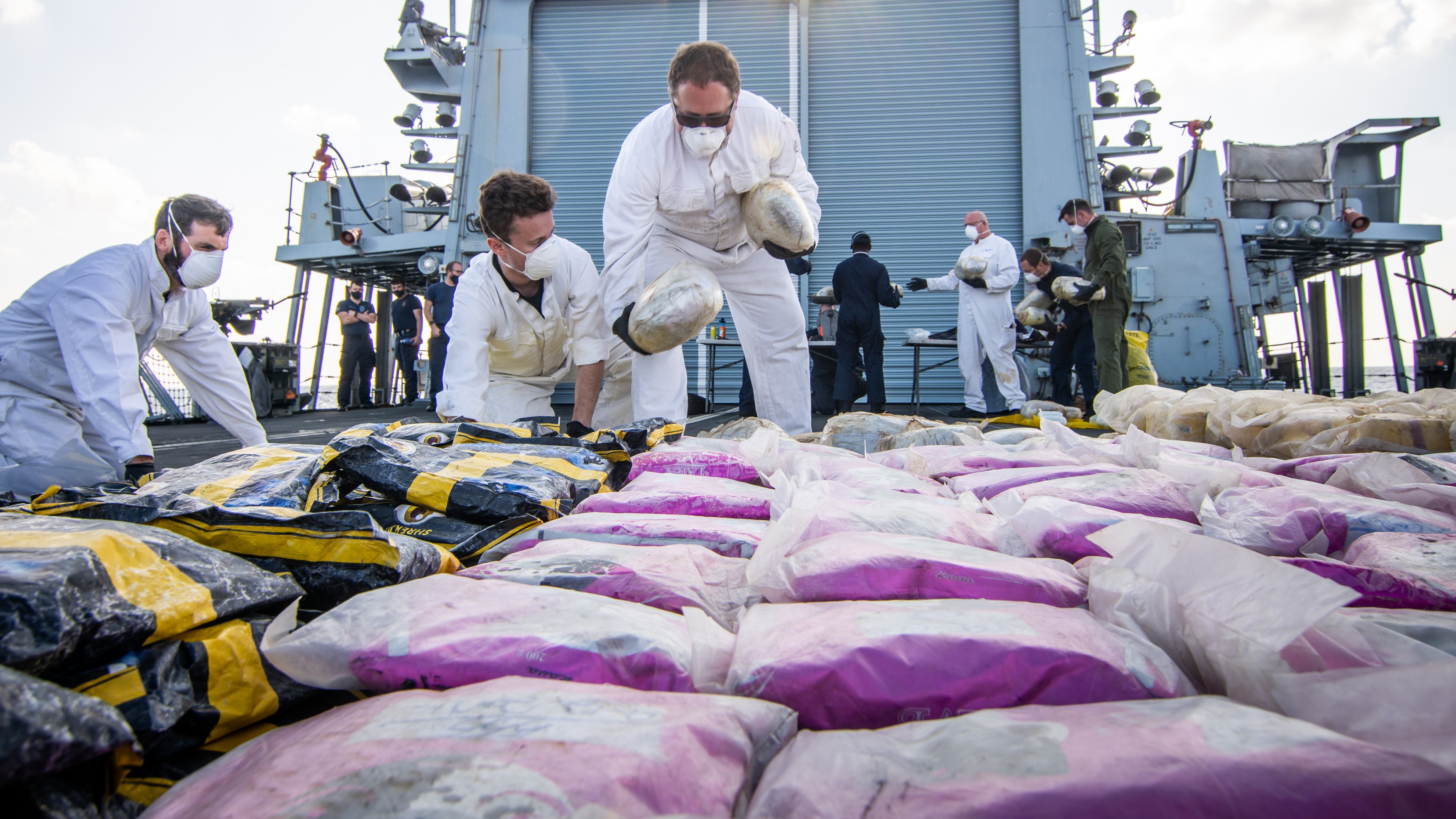 A drugs haul is laid out on Montrose's flight deck