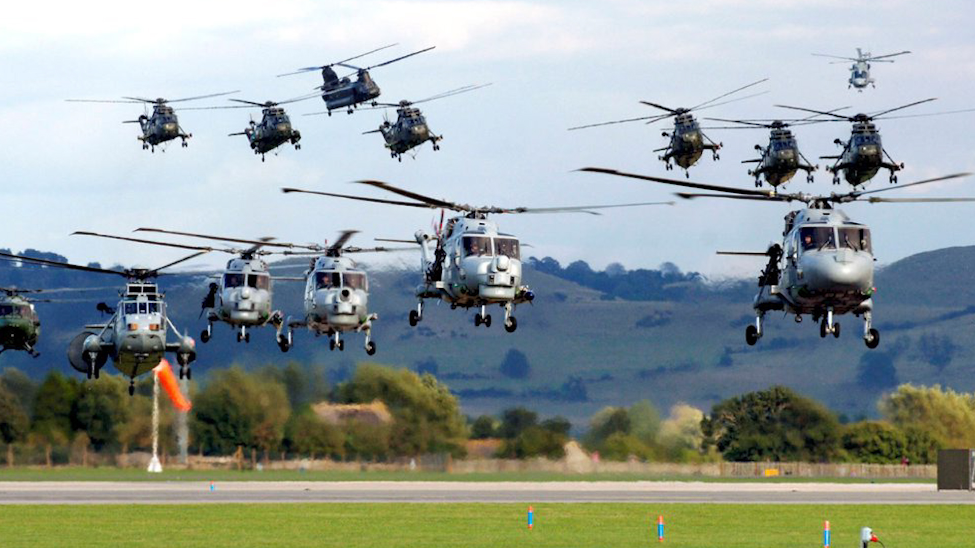 A flypast of all the different helicopters in service with the RN, during the International Air Day at RNAS Yeovilton 170905 CREDIT MOD