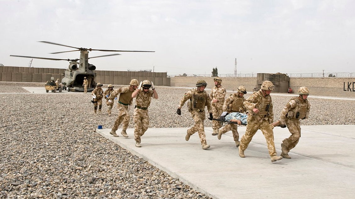 A medical emergency response team receiving a casualty in Afghanistan DATE UNKNOWN CREDIT ARMY MOD.jpg