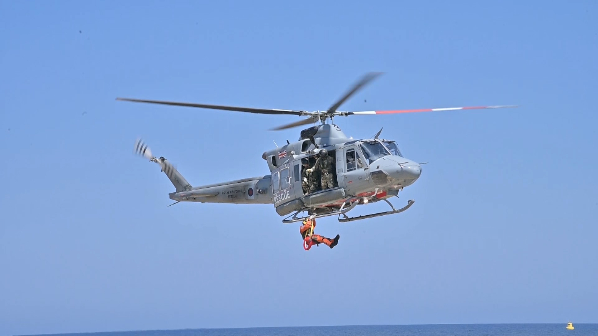	A member of the last remaining search and rescue unit in Cyprus, RAF's 84 Squadron, being winched down during a training exercise in Cyprus