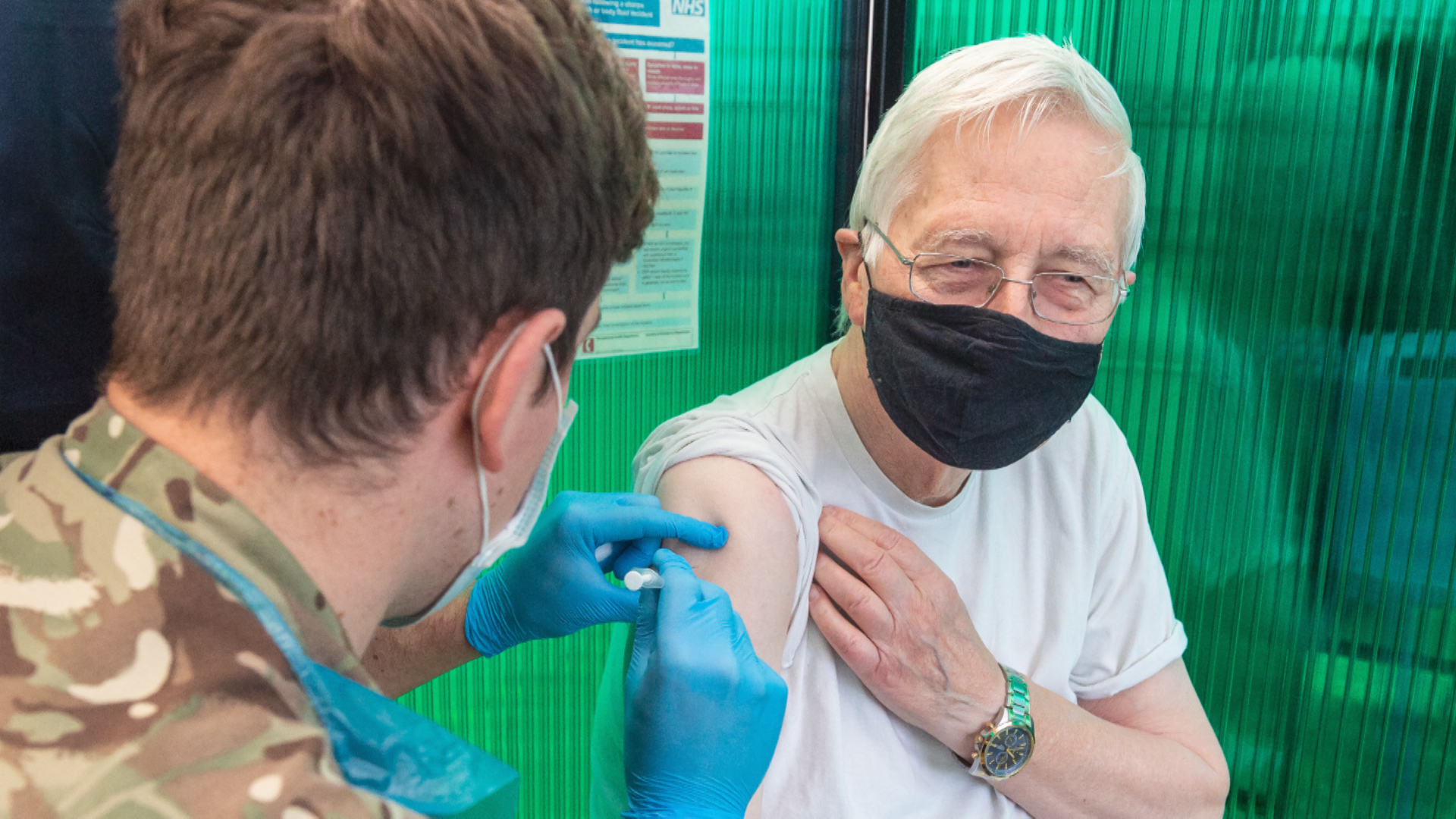 A member of the public receives the Pfizer Covid-19 vaccination from a Royal Army Medical Corps (RAMC) doctor at a mass vaccination site in York on 20 January 2021 (Picture: MOD).