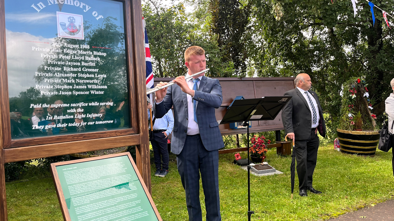 A musician playing during the memorial service in Ballygawley, Co Tyrone, to mark the 35th anniversary of the Ballygawley bus bombing in which eight off-duty soldiers attached to the 1st Light Infantry Regiment were killed by the IRA (Picture: PA Media).