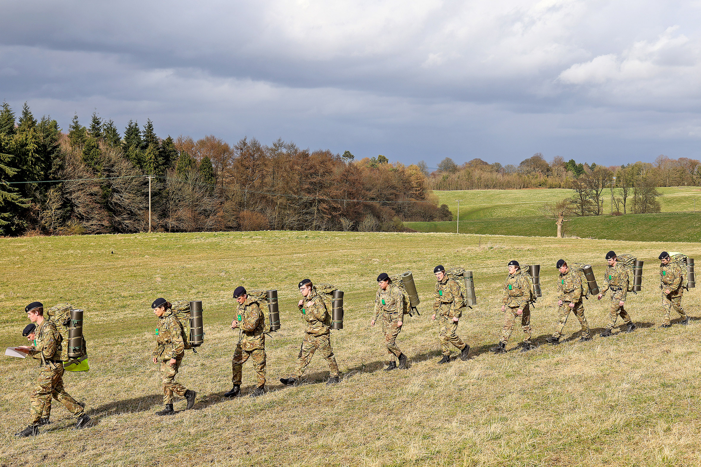 A recruit leads fellow trainees from HMS Collingwood through the Wiltshire countryside during Exercise Hidden Dragon DATE UNKNOWN CREDIT ROYAL NAVY .jpg