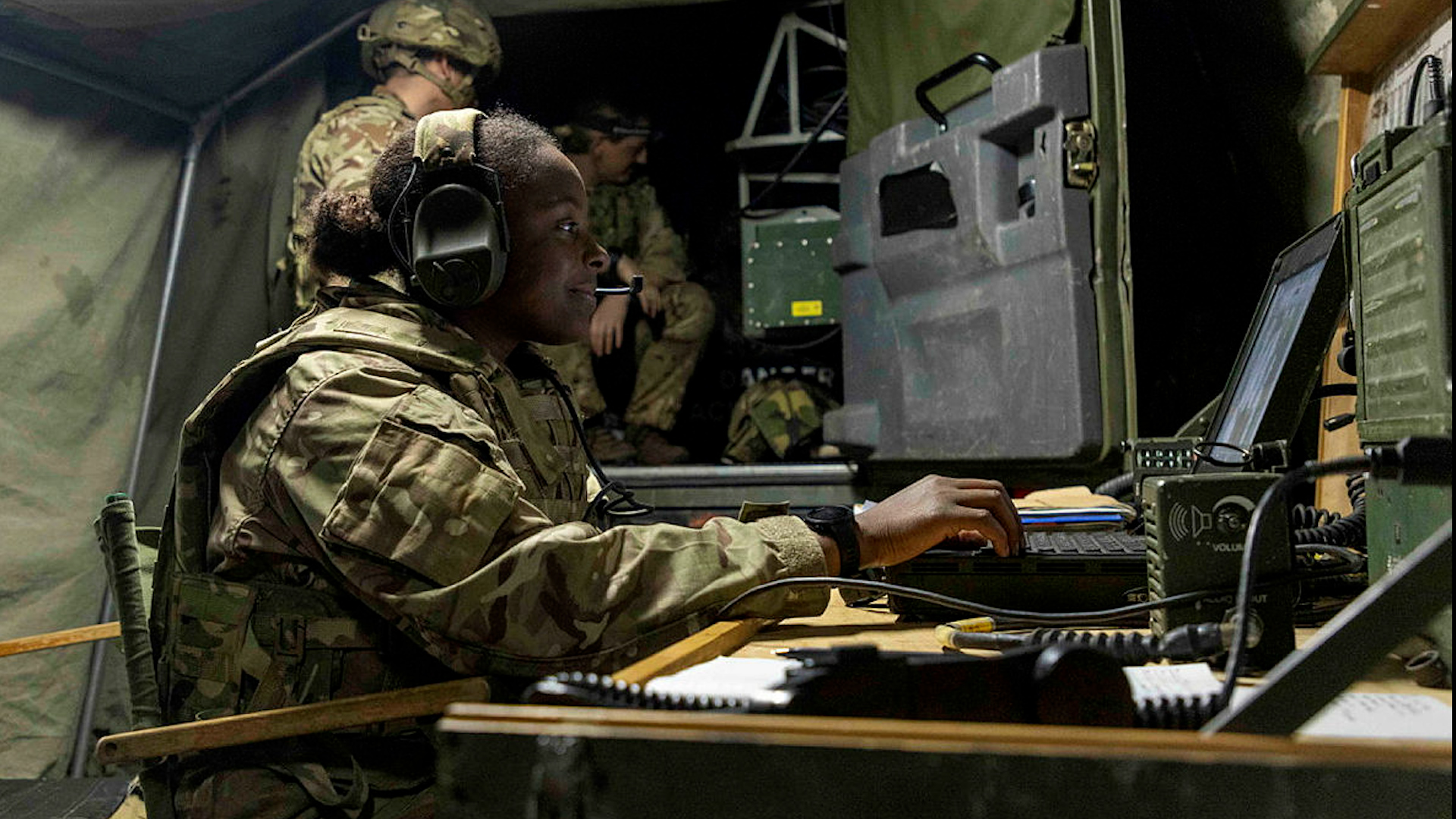 A signaller monitors comms at Excon, including a Bowman radio 110224 CREDIT MOD