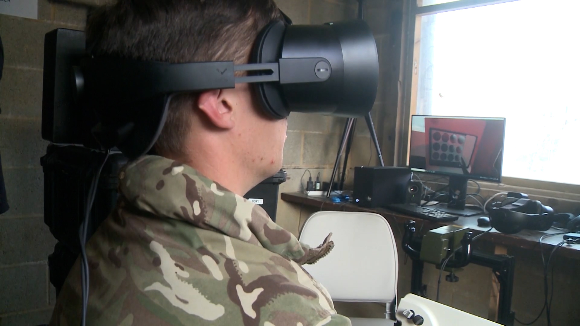 Soldiers can practice driving, loading and firing a Challenger 3 tank using portable simulators.