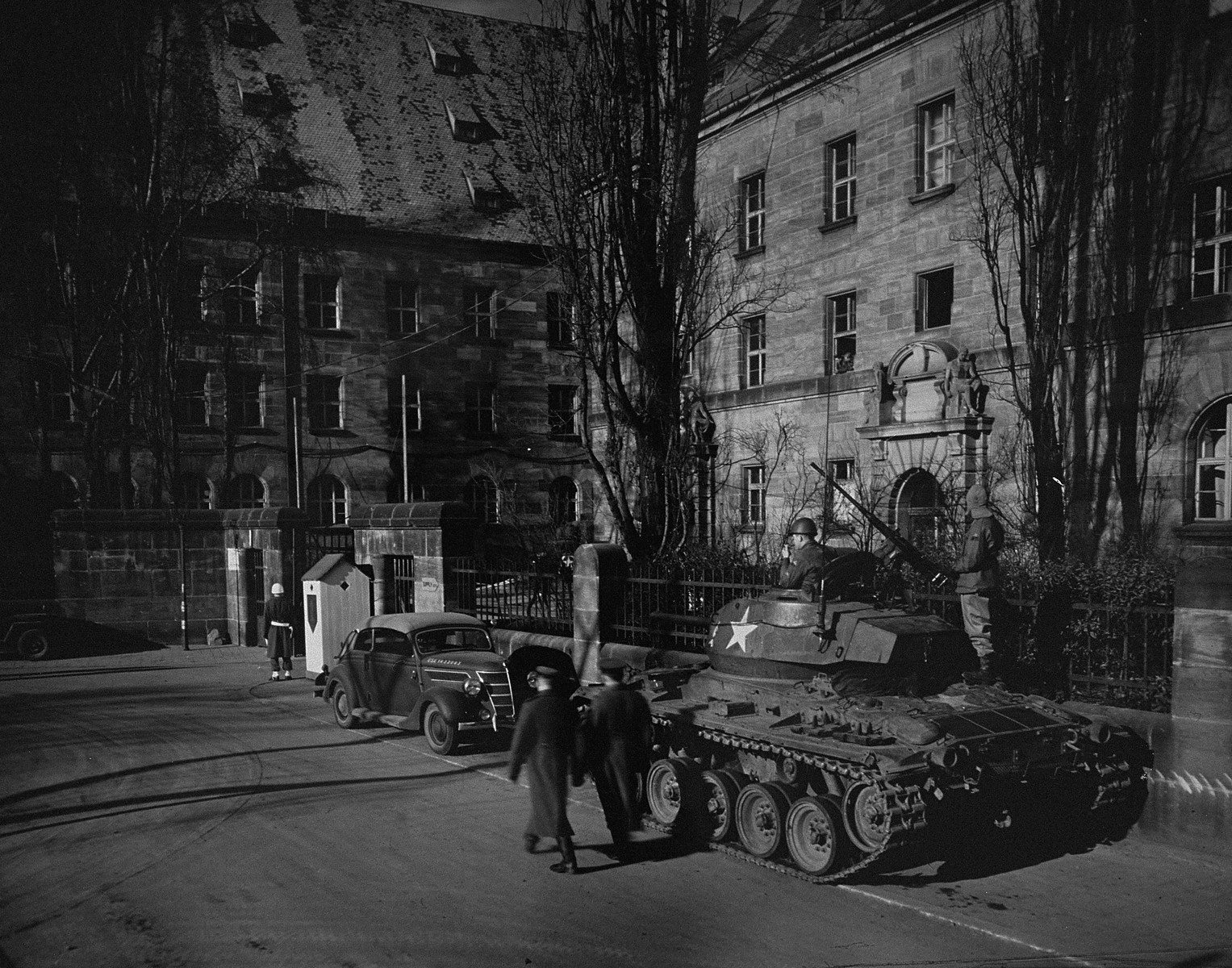 A tank guards the entrance to the Palace of Justice in Nuremberg, where the International Military Tribunal trial of war criminals was held.