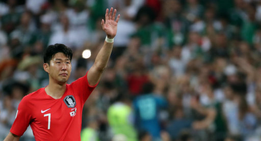 A teary eyed Son after South Korea were knocked out in the group stage at the World Cup (Picture: PA).