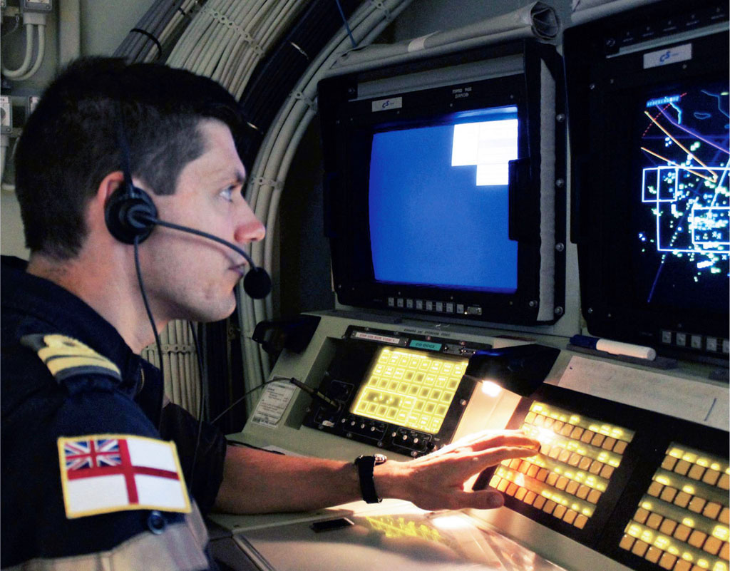 In 2014, Lt Cdr Roberts served on French flagship FS Charles de Gaulle as a fighter controller (Picture: Royal Navy).