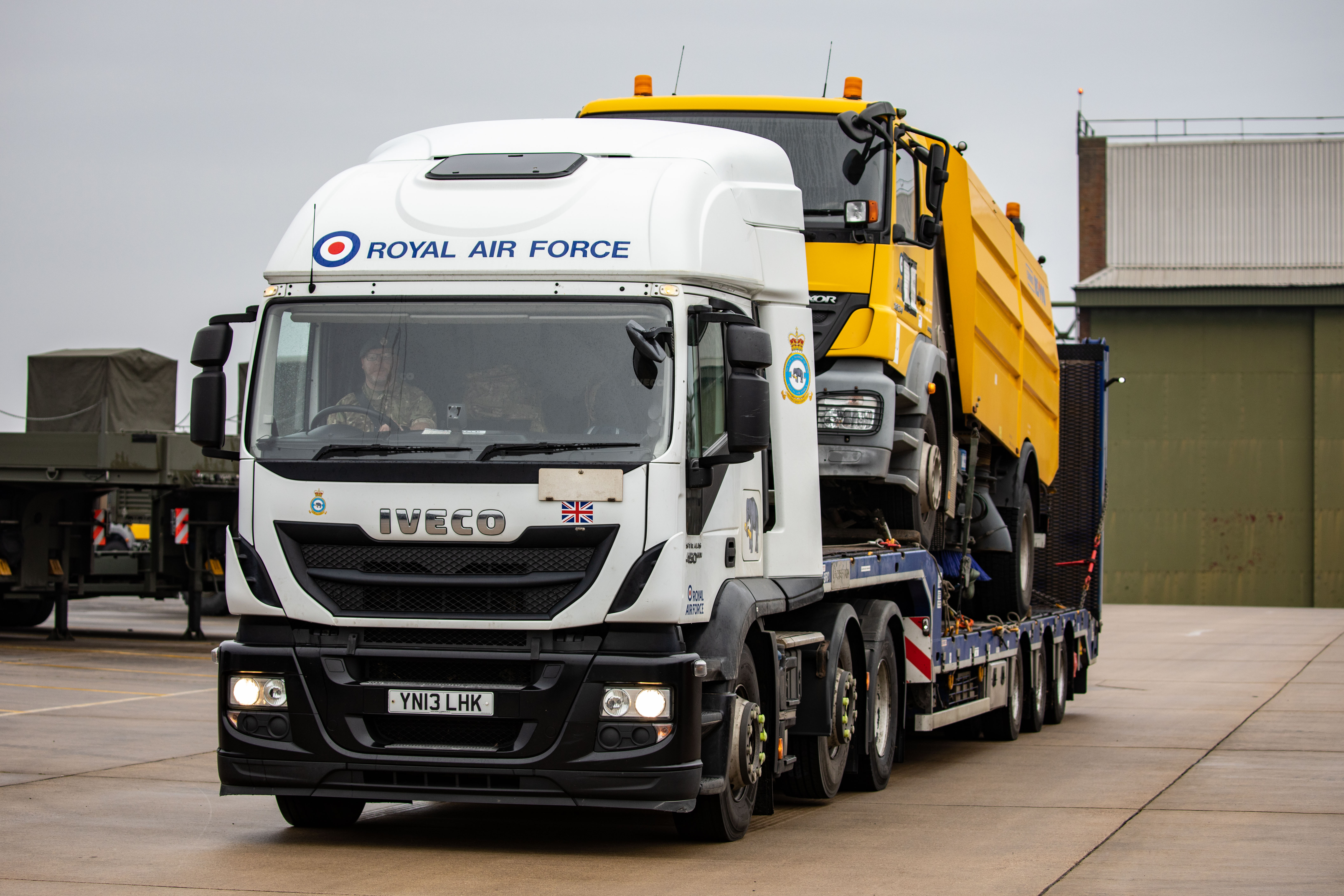A truck from 2 (MT) Squadron rolls out from RAF Wittering on their way to Marchwood ahead of NATO's Air Policing Mission