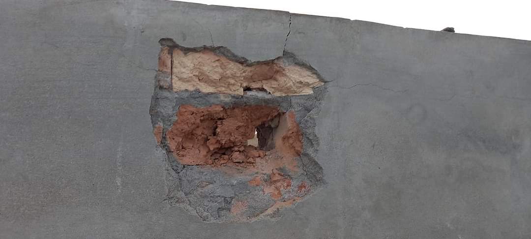 A wall is damaged during an attack by the Taliban on Lashkar Gah in Afghanistan.