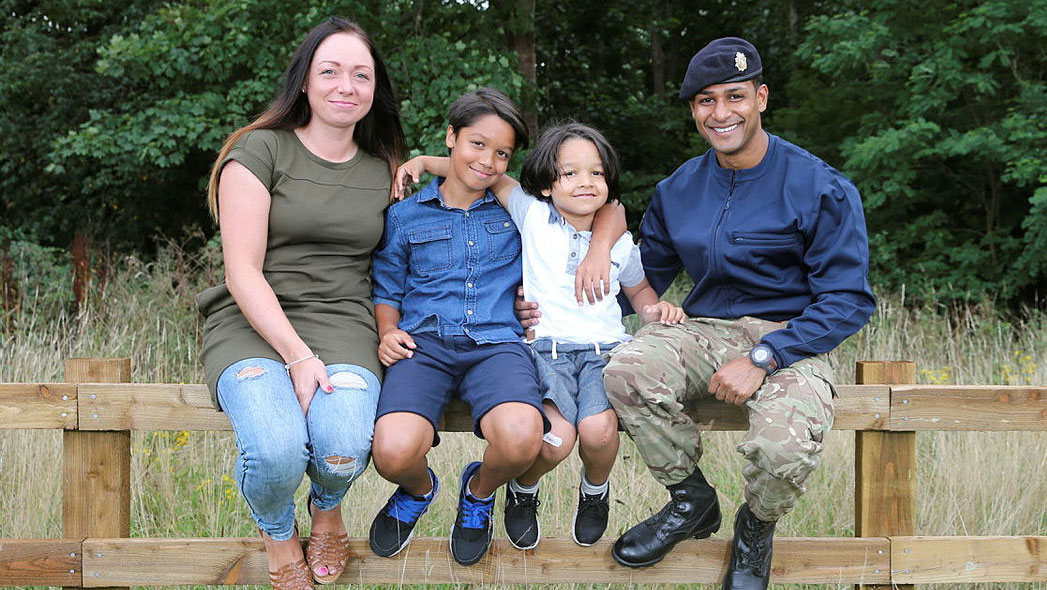 A Lance Corporal pictured with his wife and two children in 2015 CREDIT Crown Copyright