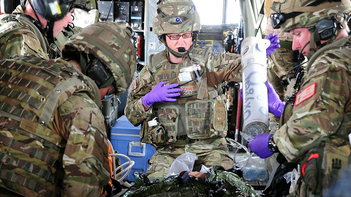 A casualty is tended to in 2011 onboard a MERT Medical Emergency Response Team Chinook helicopter following an engagement with the enemy in Afghanistan CREDIT Crown Copyright